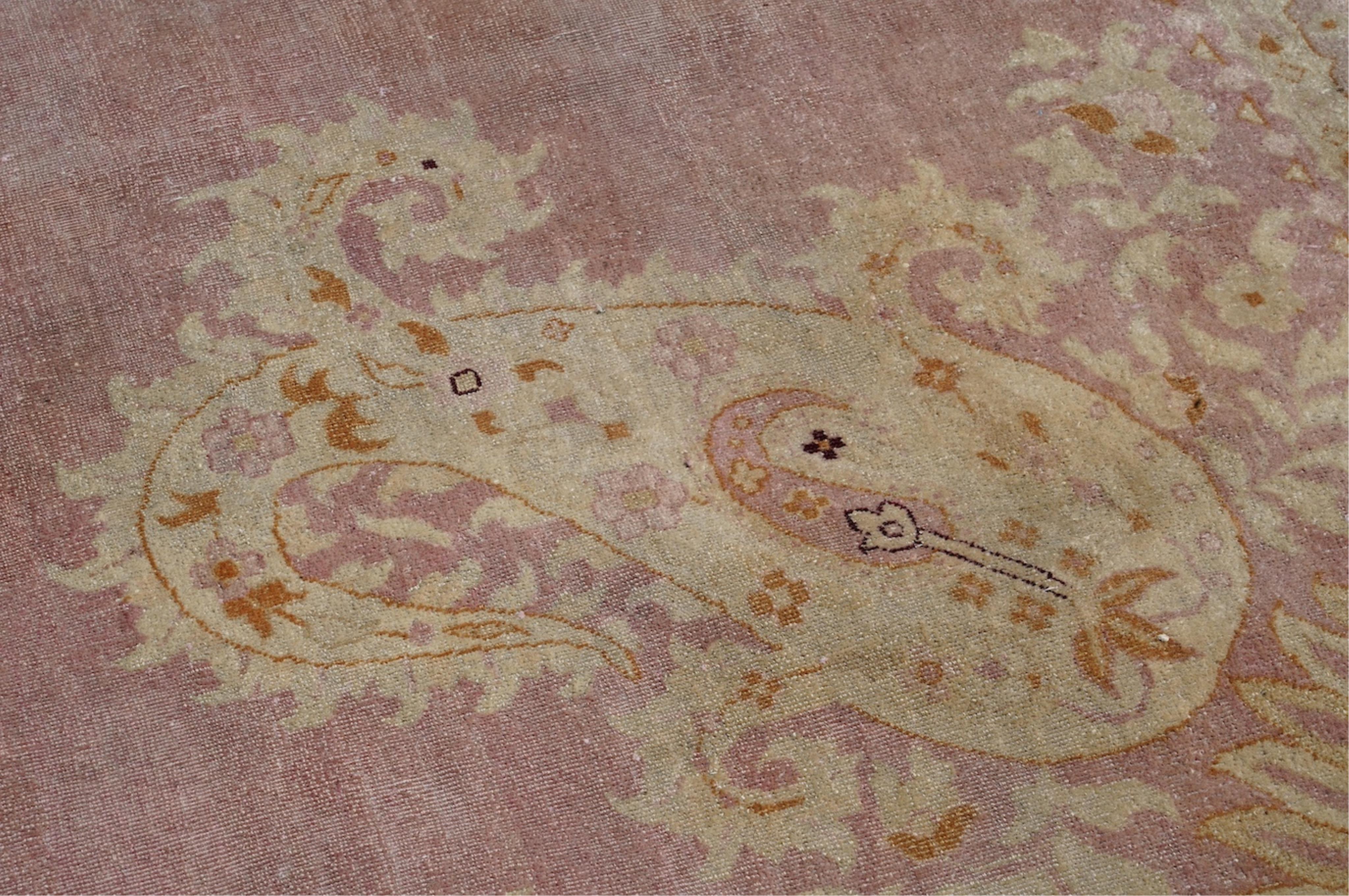 An Amritsar carpet, approximately 580 x 395cm. Condition - poor
